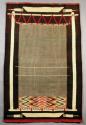 Germantown pictorial rug representing partially woven rug on loom frame