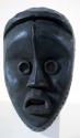 Black wooden mask (Ga si Glu) - This Devil organises small boys into a band for