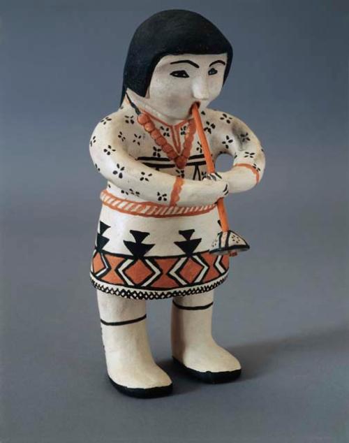 Polychrome-on-off white male flute player