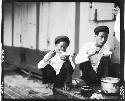 Children eating rice