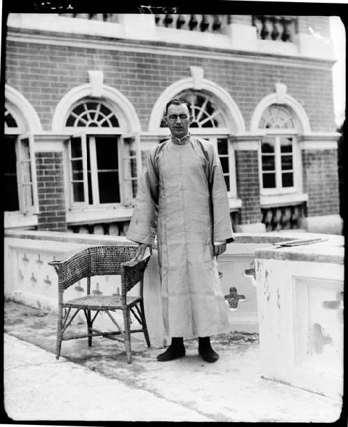 Man standing outside building