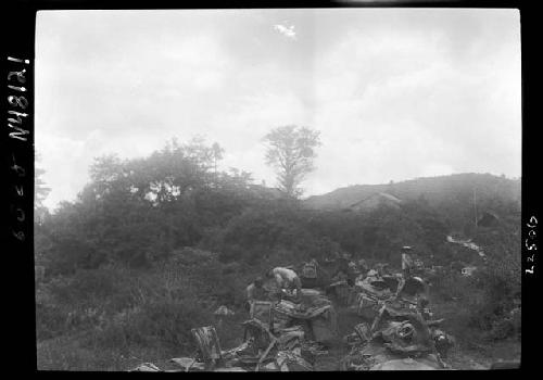 People and cargo in field