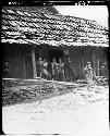 People lined up along building