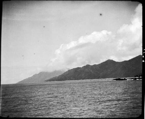 Body of water, with hills on horizon