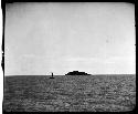 Body of water and small island, viewed from water