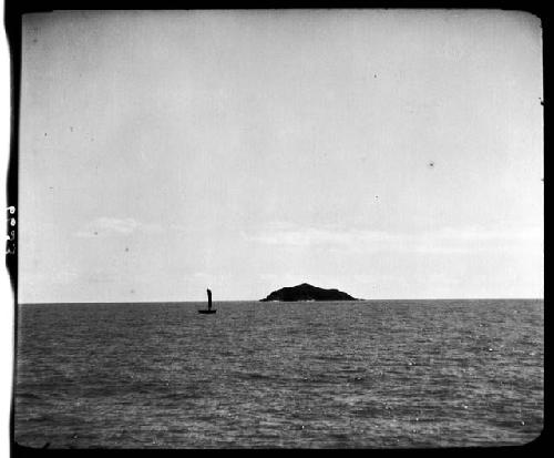 Body of water and small island, viewed from water