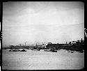 Body of water, with buildings on shoreline