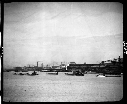 Body of water, with buildings on shoreline