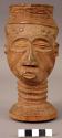 Carved cup in shape of human head