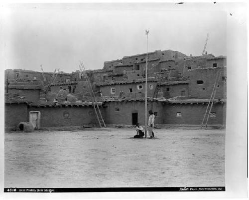 Frank Hamilton Cushing in Zuni pueblo plaza