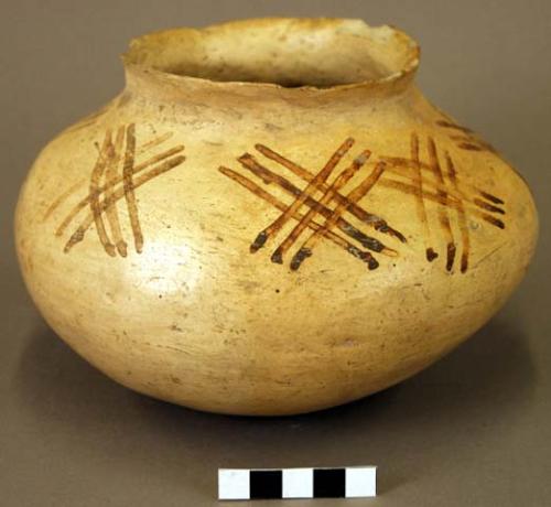 Ceramic jar, red on buff liniar exterior, slightly flared rim