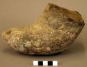 Ceramic vessel, irregular shape, "shoe-shaped," plain exterior, flat base