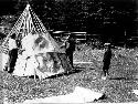 People building wigwam