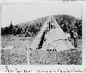 People building wigwam