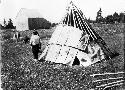 People building wigwam