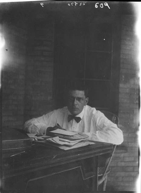 Man seated at table