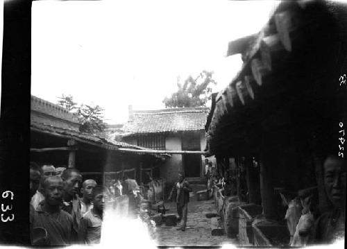 People gathered in stable area