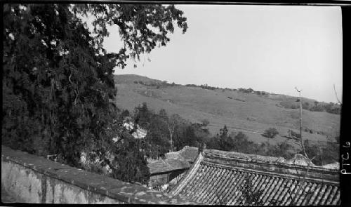 Tops of buildings, hillside