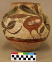 Ceramic jar, polychrome exterior with bird motif, short neck