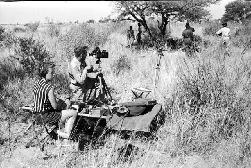 Group of people being interviewed by Lorna Marshall, with Kernel Ledimo and Dabe interpreting