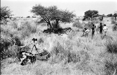 Group of people being interviewed by Lorna Marshall, with Kernel Ledimo and Dabe interpreting