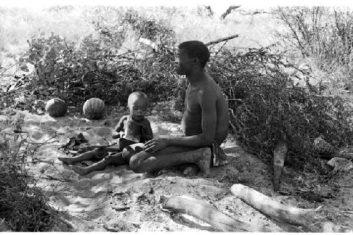 !Gai and Oukwane sitting at their living place in the werft