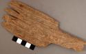 Paddle-shaped tool made of ironwood, edge of paddle irregular--teeth? l: 17.6 c