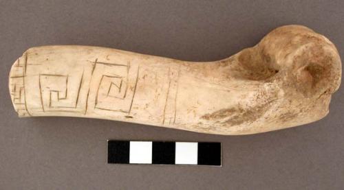 Bone, joint and partial shaft with incised geometric decoration