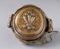 Thick, almost round copper charm box (slightly pointed at top).