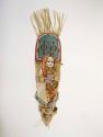 Child's large doll cradle. Head piece fringed and decorated with beadwork.