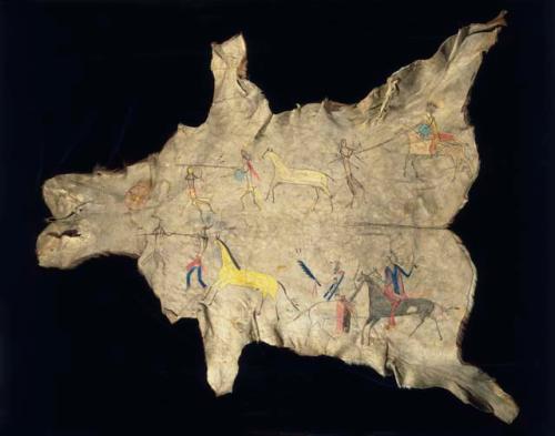 Plains painted elkskin, probably Sioux. Painted design of warriors on horses and