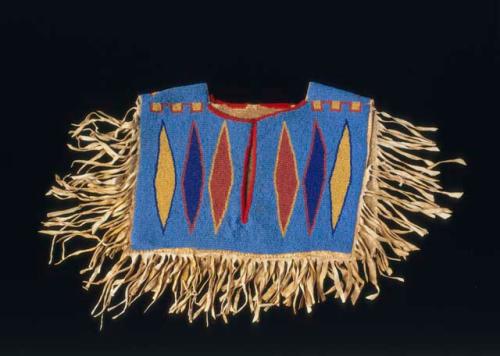 Beaded vest with fringe of skin along outside edges - child's?