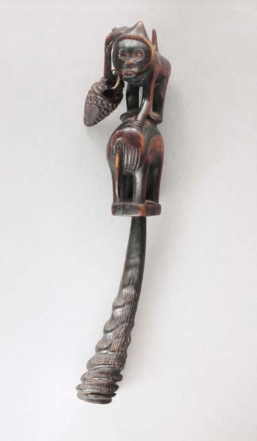 Horn whistle with figurative finial