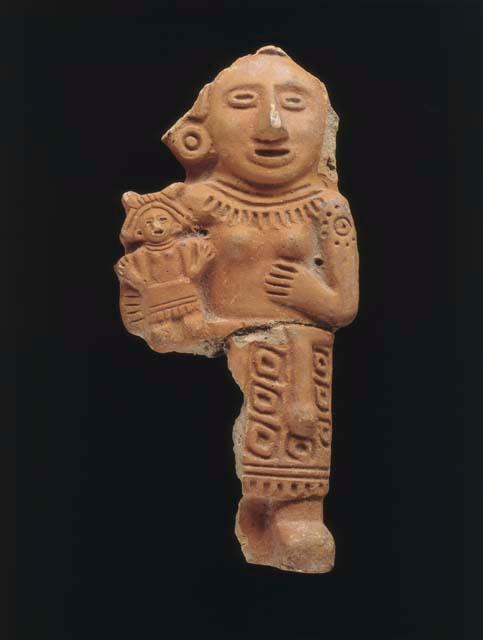 Terra cotta figurine fo woman carrying child or cult image