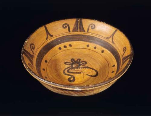 Black-on-orange pottery dish