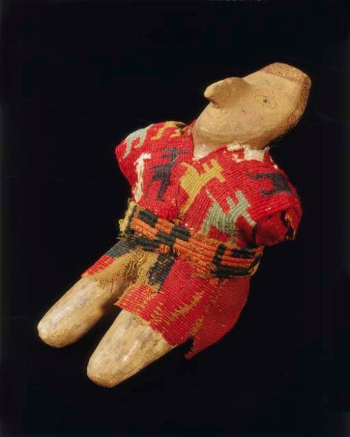 Pottery figure with clothing