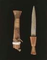 Knife with wood handle and wood sheath; grips of twined wire at either end; hide