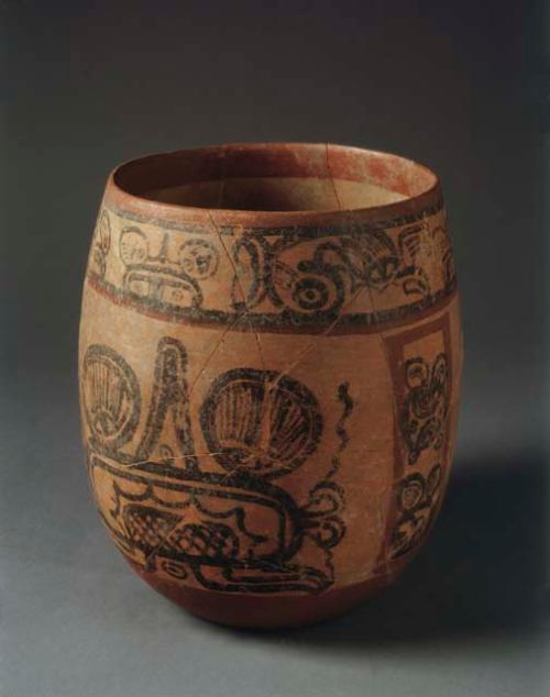 Complete ceramic jar, polychrome, heiroglyphic band near rim, flat base, mended.