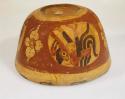 Yojoa polychrome pottery bowl, dimpled base. Bold Anamalistic type (restored).
