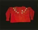 Woman's blouse, red cotton with silver discs used as decoration.
