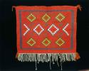 Saddle throw blanket. Germantown, red background with stepped outline diamonds