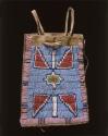 Woman's bag used to hold personal items. Beadwork is lazystitch (central Plains)