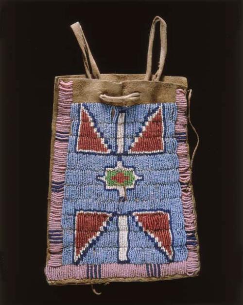 Woman's bag used to hold personal items. Beadwork is lazystitch (central Plains)