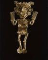 Human figure in gold, holding a rectangular object in each hand.  Loop on back