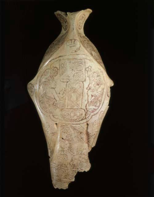 Peccary skull with incised scene and glyphs