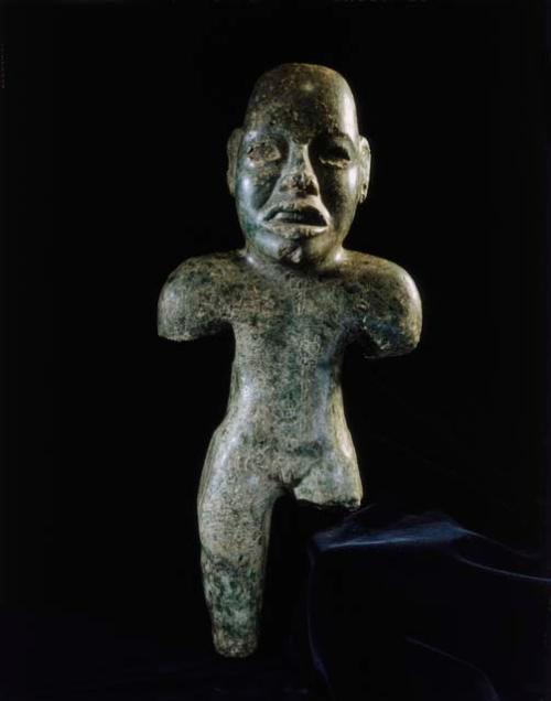 Human figure with incised designs