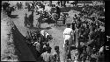 Crowds of people along road