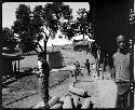 Children along dirt road