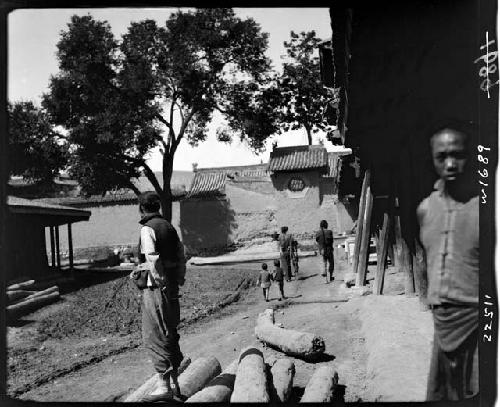 Children along dirt road