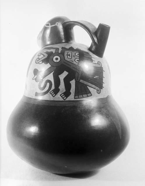 Gourd shaped jar, short spout neck; human head
